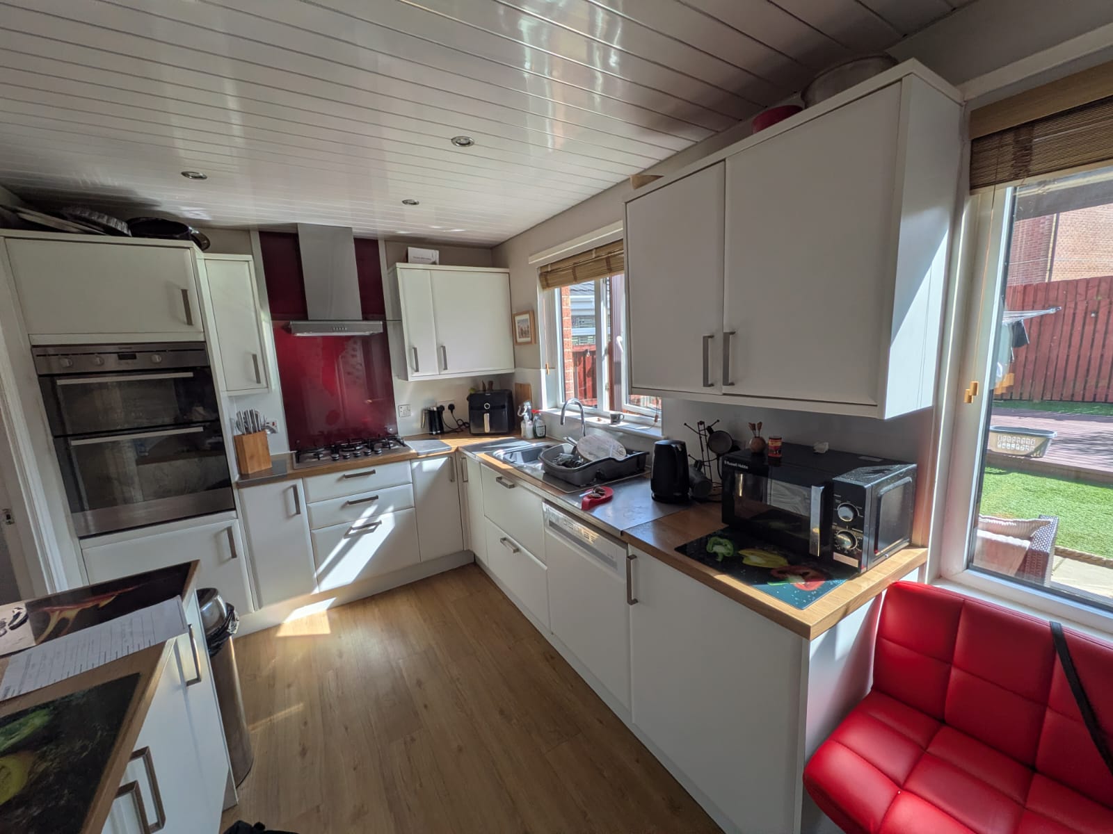 Kitchen before, tired surfaces