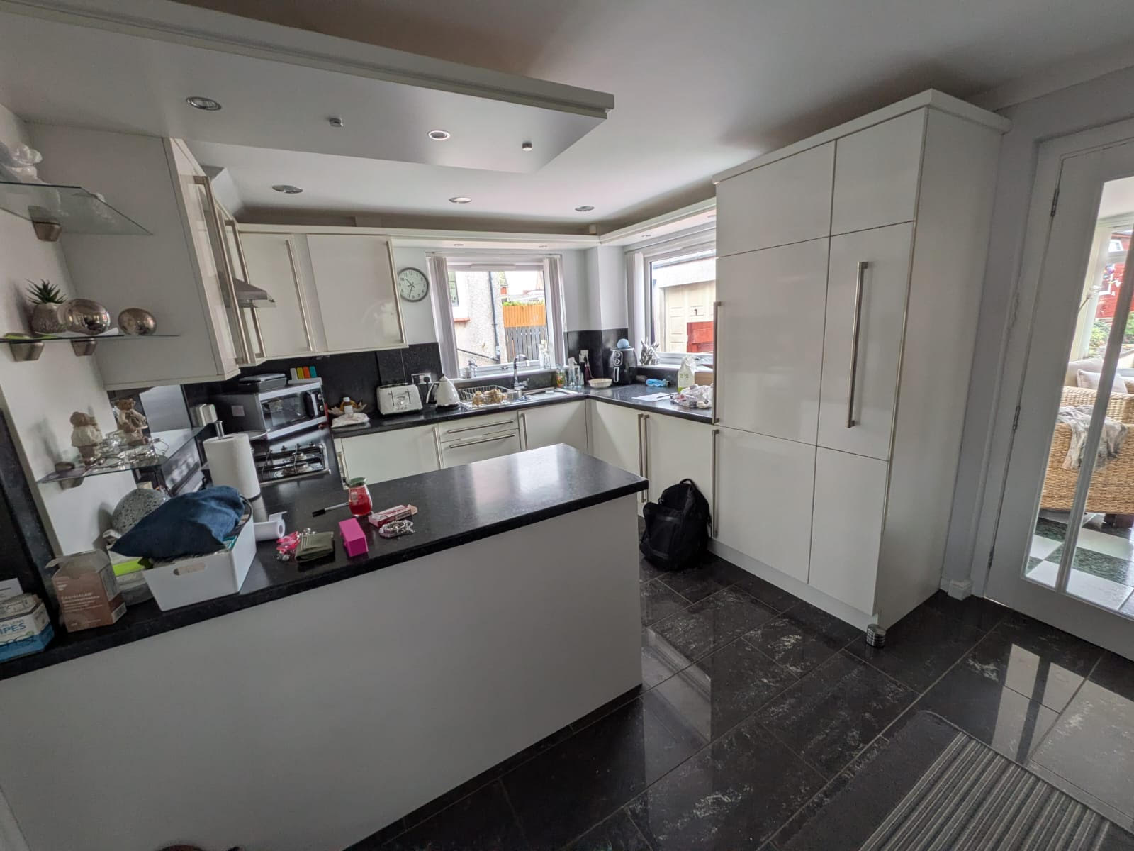 Glasgow kitchen before, white gloss doors and black granite